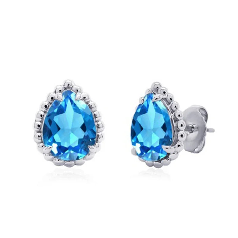 Sterling Silver White Gold Plated 9x7mm Pear Shaped Blue Topaz Color Stud Earrings