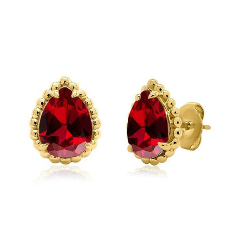 Sterling Silver Yellow Gold Plated 9x7mm Pear Shaped Garnet Color Stud Earrings