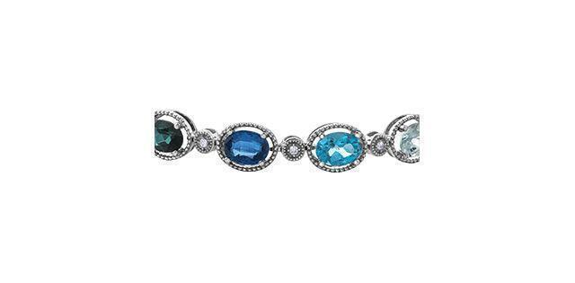 0.14TDW Diamond and Blue Gemstone Bracelet in 10K White Gold