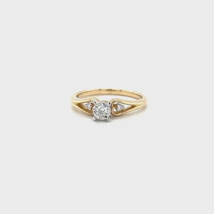 0.15TDW Diamond Solitaire Engagement Ring with Side Accents in 10K Yellow Gold
