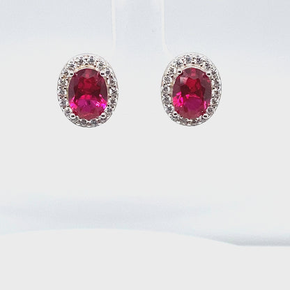 July Birthstone Ruby CZ Oval Halo Stud Earrings in Sterling Silver