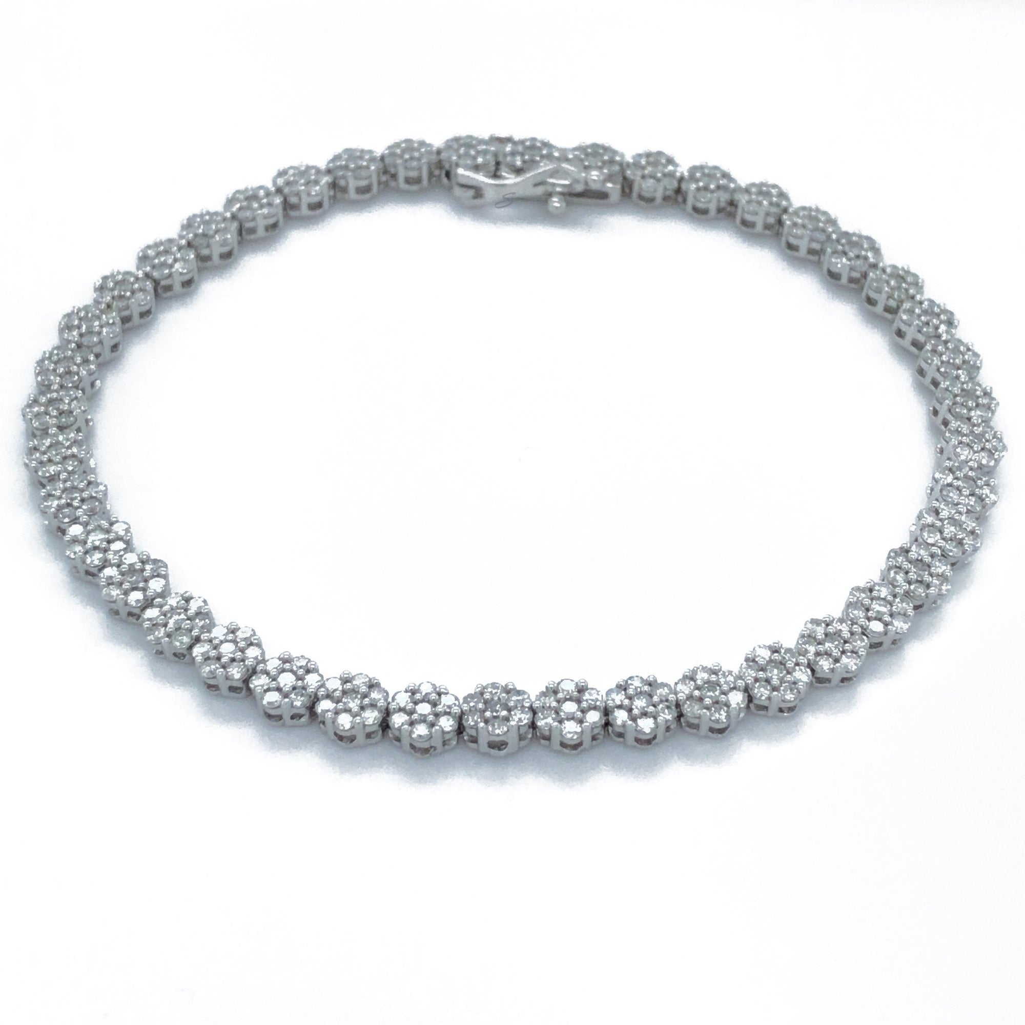Diamond tennis bracelet set in white gold illusion setting. Available now.  | Beautiful jewelry, Tennis bracelet diamond, Bracelets